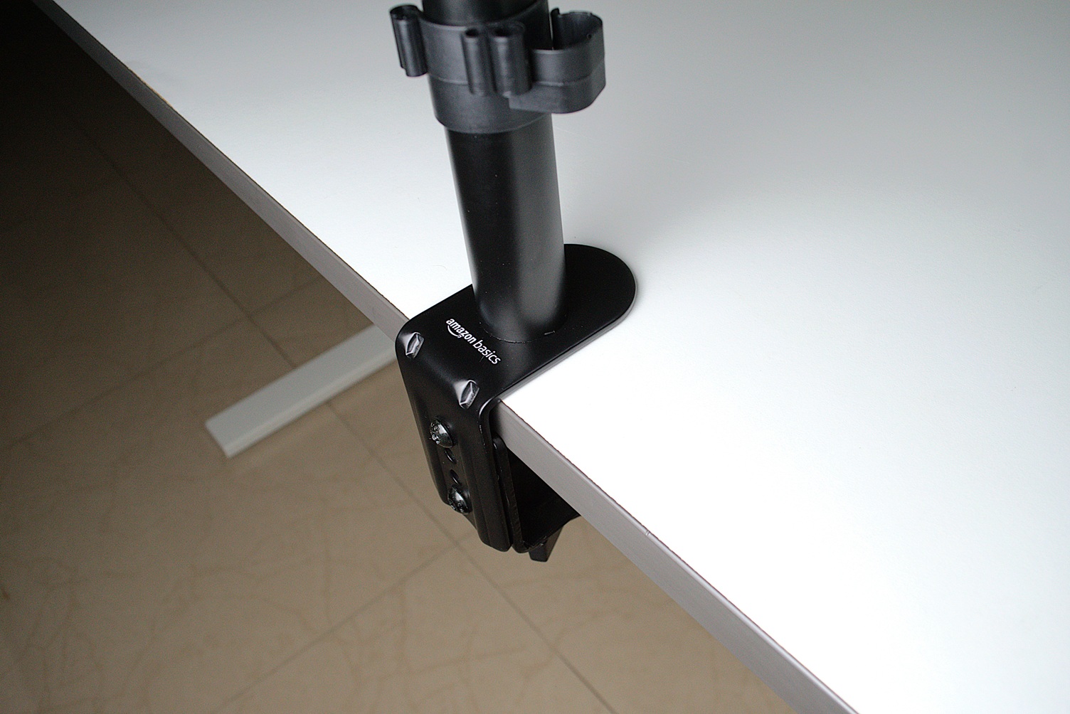 C-Clamp of a monitor stand mounted to a desk