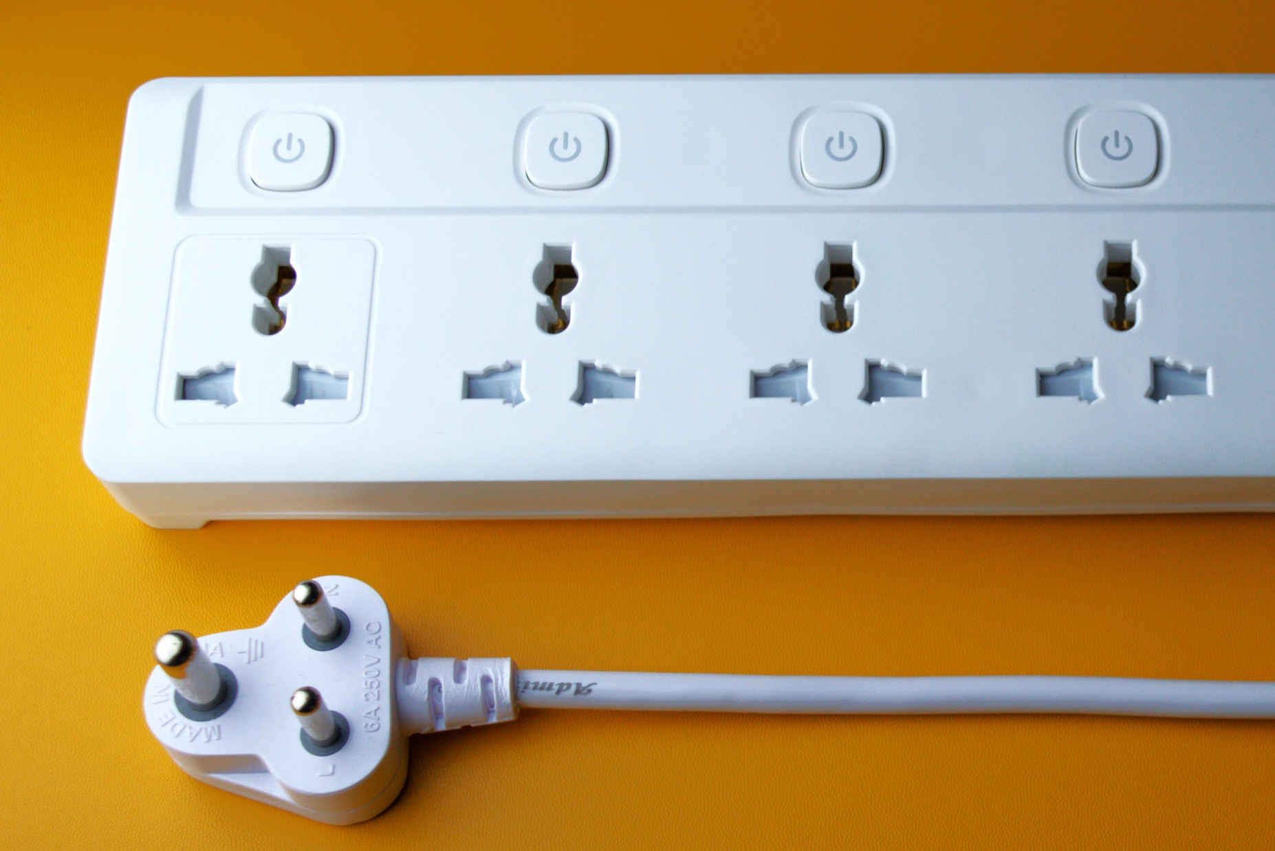 White power strip with its power cord