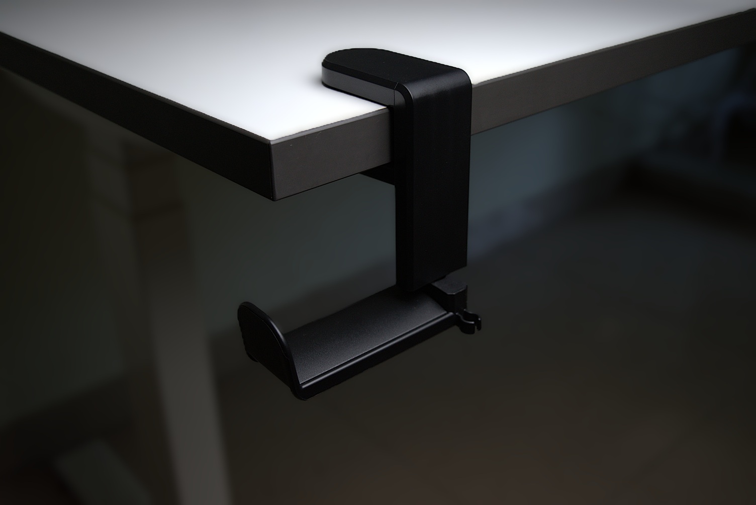 Clamped headphone hanger rotated left