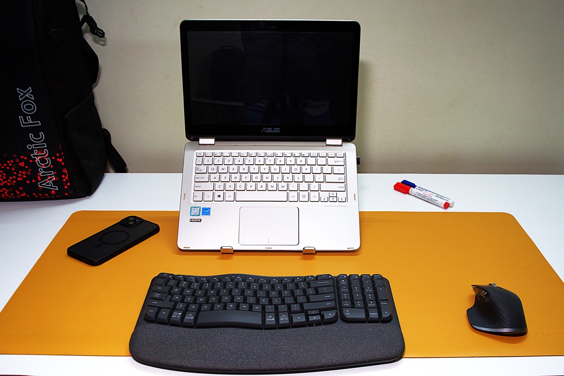 Laptop stand in a desk setup