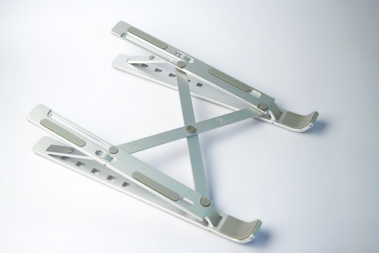 Metallic laptop stand in normal expanded position