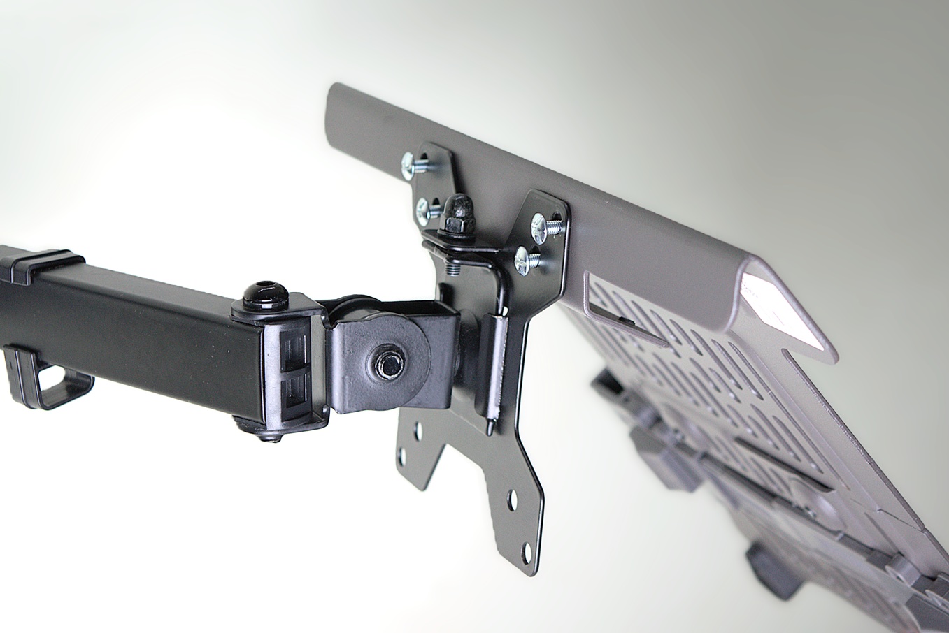 Fitting a laptop tray to the VESA mount on a monitor arm