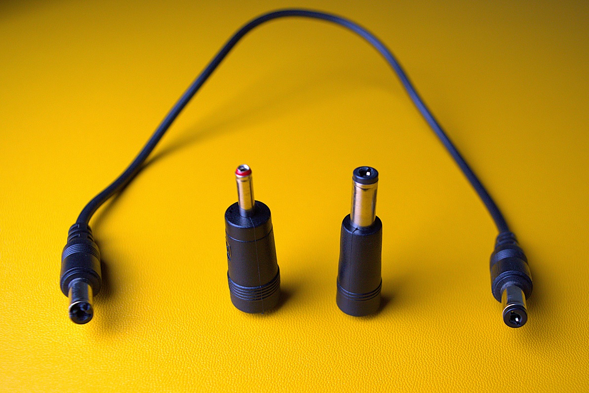 Cables and convertor pins that came with the mini UPS for router