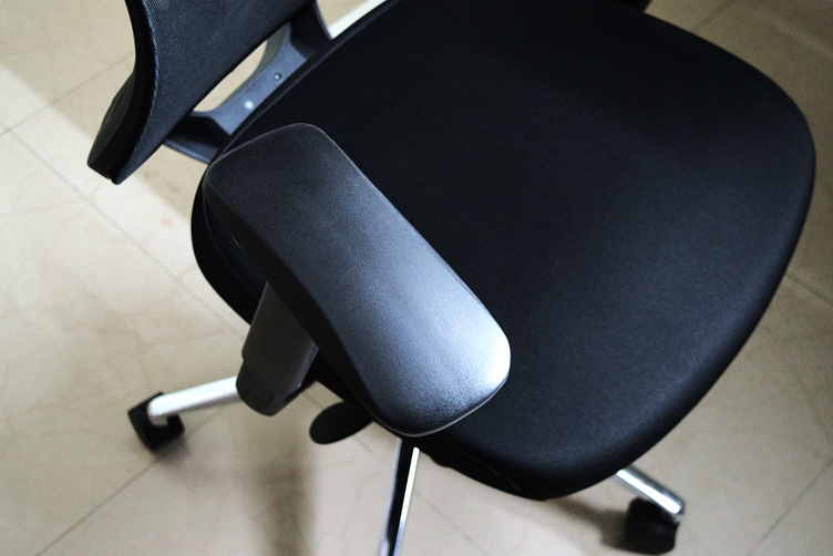 Arm rest of the office chair moved to the right