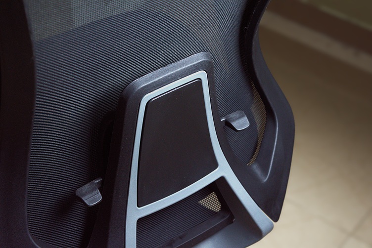 Lumbar support of the office chair pulled down