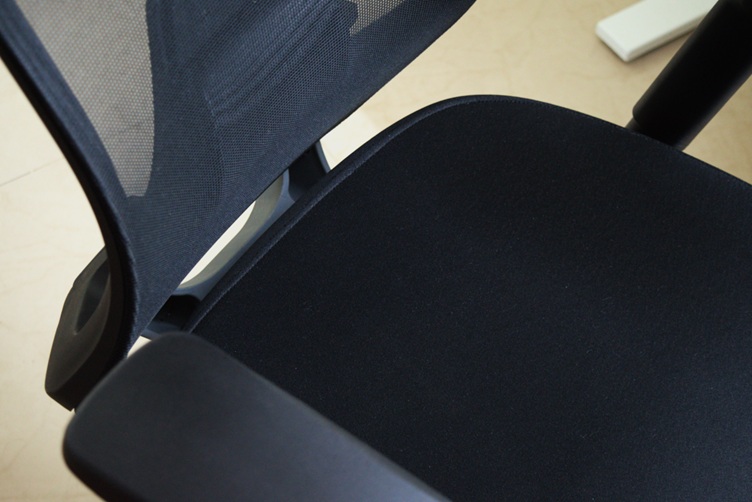 Seat of the office chair moved backward