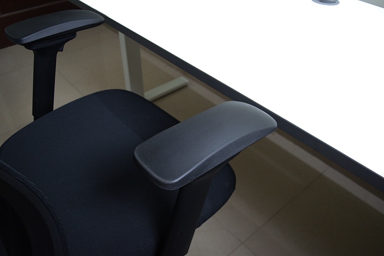 Standing desk next to an office chair