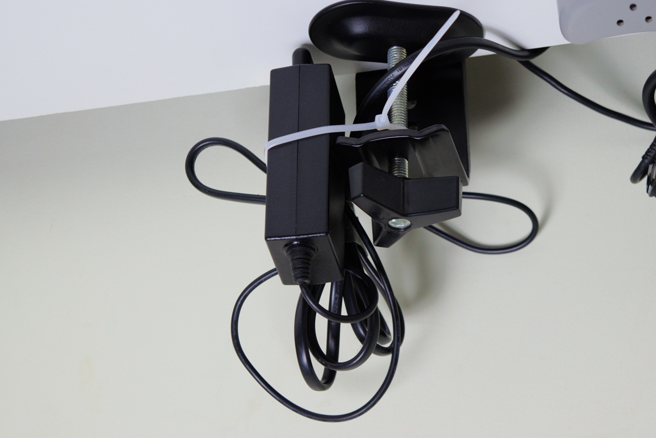 Hanging adaptor under the desk