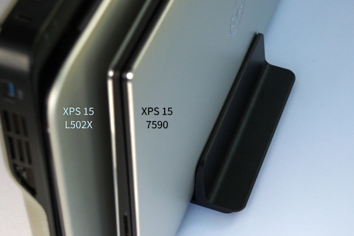 Vertical laptop stand holding a Dell XPS