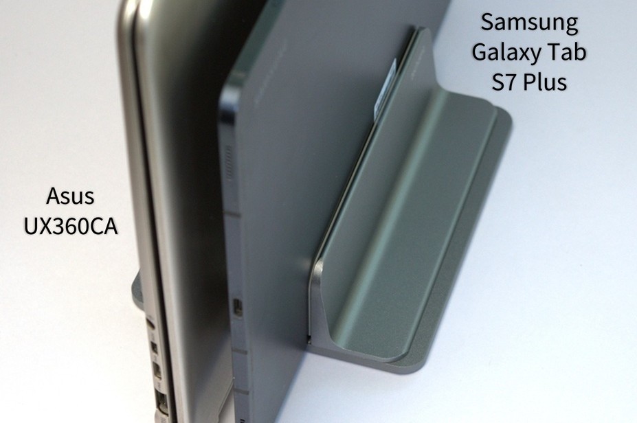 Vertical laptop stand holding other lean laptops and tablets