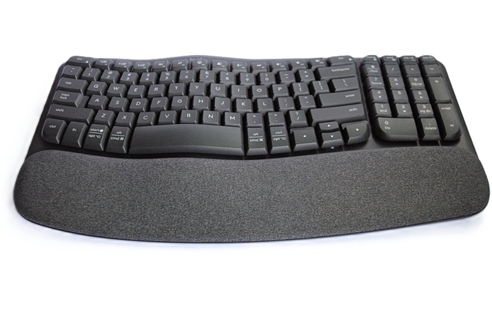 Black Logitech Wave Keys keyboard on a white desk
